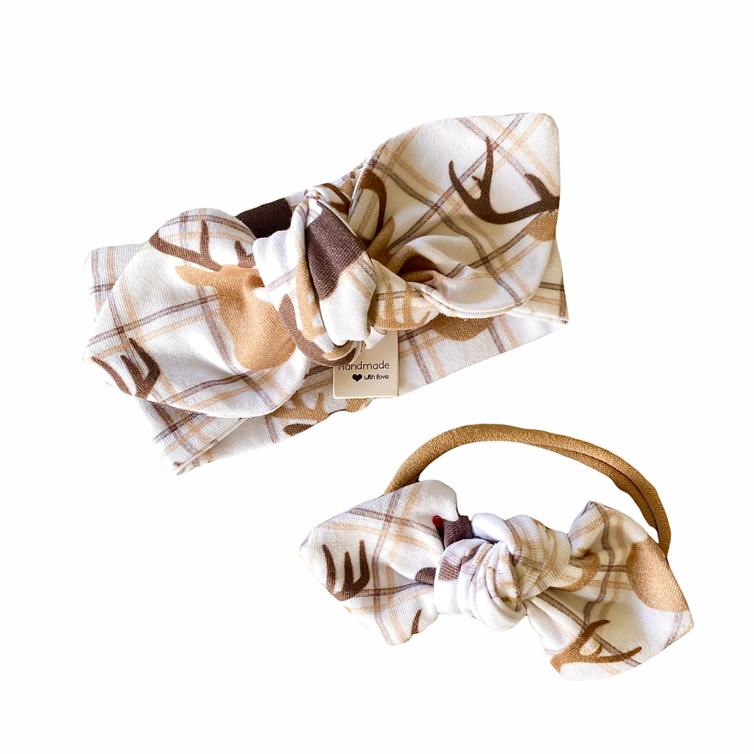 Handmade reindeer plaid headband set featuring a top knot headband and a tiny bow on a soft nylon band, perfect for baby girls this holiday season.