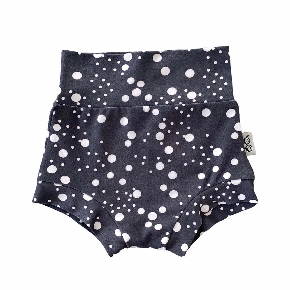 Handmade polka dot bummies for babies and toddlers, featuring a stylish black and white design. Soft, comfortable, and perfect as a diaper cover or for everyday wear. Ideal for active little ones and special occasions alike.