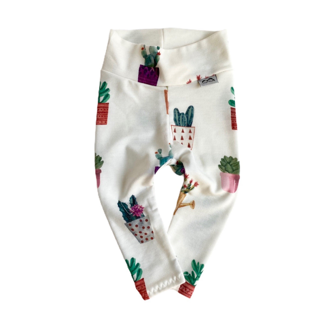 Baby leggings with cactus pot print on a white background, soft and stylish for everyday wear.