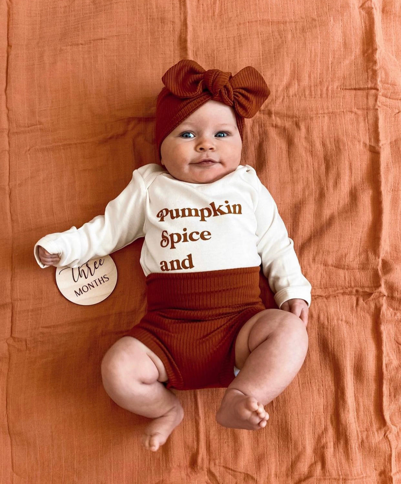 Rust best sale baby onesie